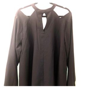 Plus size long sleeve black cold shoulder blouse.